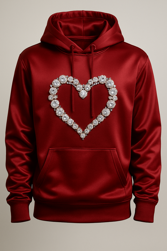 Red hoodie with a heart-shaped design made of pearls on a beige background